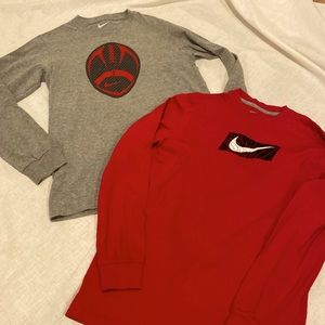 2 Nike tee shirts size large. One red with logo other grey with logo